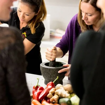 Guests at an Asian cooking class