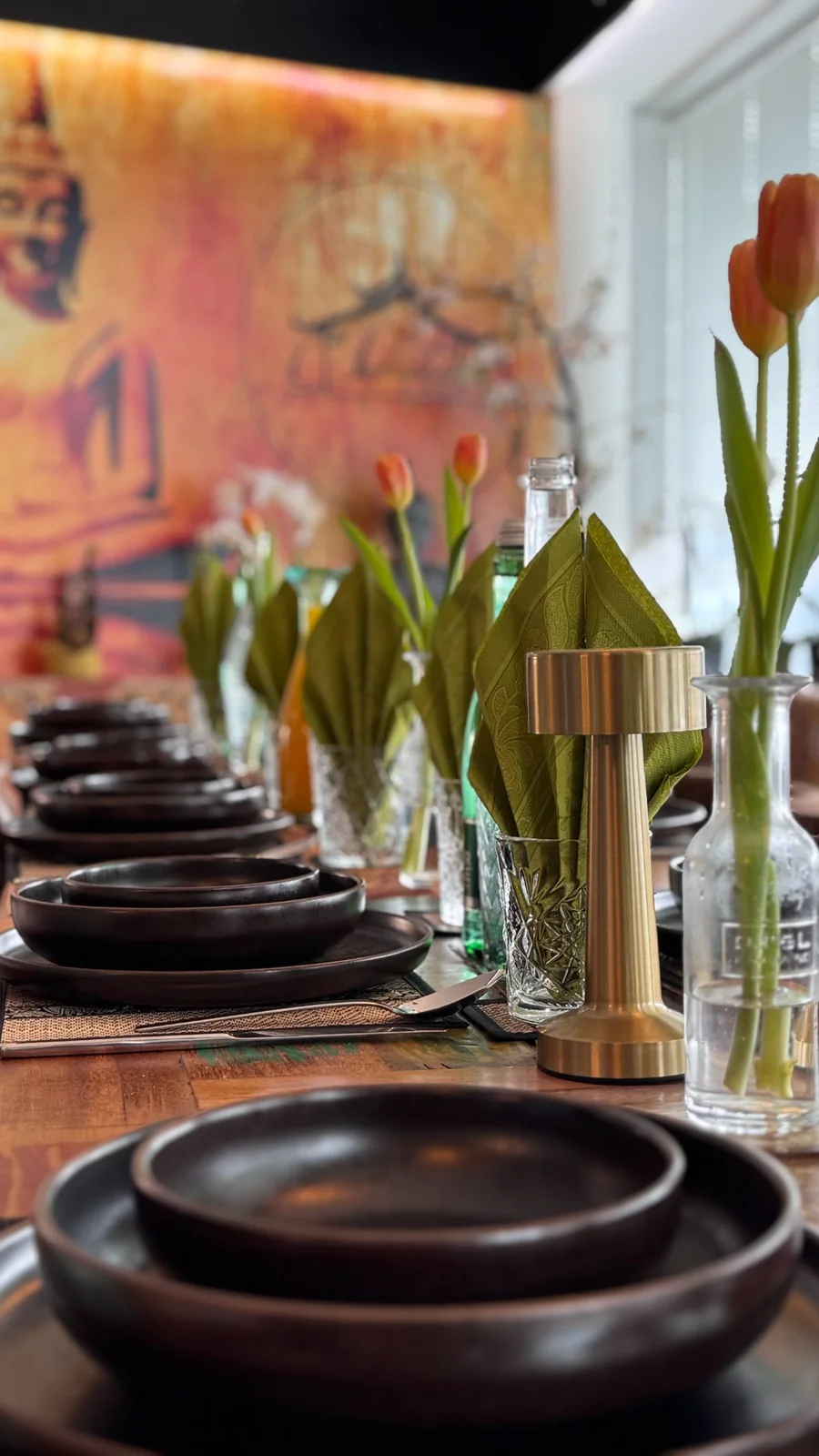 Festively set table with tulips for a private dinner